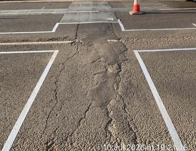 Longitudinal wheel-track deterioration on Sopwith Way in Kingston upon Thames before Elastomac repair