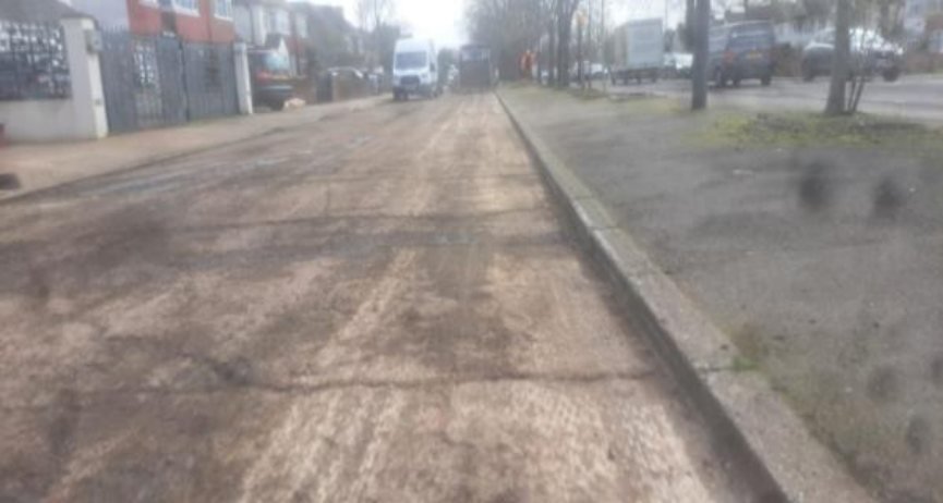 Failing asphalt overlay on the original concrete carriageway at Uxbridge Road TW13